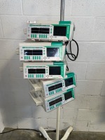 LOT OF BRAUN OUTLOOK 400ES INFUSION PUMPS ON ROLLING STAND