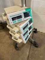 LOT OF BRAUN OUTLOOK 400ES INFUSION PUMPS ON ROLLING STAND