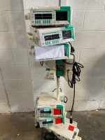 LOT OF BRAUN OUTLOOK 400ES INFUSION PUMPS ON ROLLING STAND