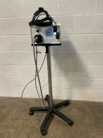 SPECIALTIES OF SURGERY XLS-300 XENON LIGHT SOURCE W/ HEADSET ON ROLLING STAND