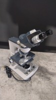 AO SCIENTIFIC 1130A LAB MICROSCOPE WITH 4 OBJECTIVES (4X,10X,40X,100X)