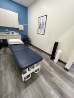 METRON ELITE ASTER 3 TREATMENT TABLE. ROLLING STOOL AND SIDE CHAIR LOCATION: NORWOOD PERFORMANCE THERAPY 30 PERWAL ST, WESTWOOD MA 02090