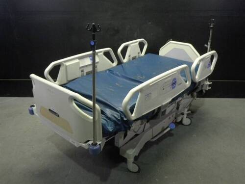 HILL-ROM TOTALCARE P1900 HOSPITAL BED WITH CPR AND FOOT BOARD