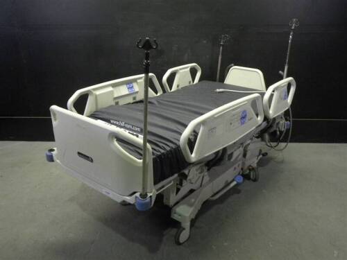 HILL-ROM TOTALCARE P1900 HOSPITAL BED WITH CPR AND FOOT BOARD