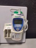 WELCH ALLYN GS 777 WALL TRANSFORMER WITH 23810 MACRO VIEW OTOSCOPE OPHTH HEAD SURE TEMP PLUS DIGITAL THERMOMETER SPHYG SPECULA DISPENSER ON WALL BOARD LOCATED AT 3325 MOUNT PROSPECT RD. FRANKLIN PARK, IL 60131 - 3