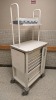 HERMANMILLER CART, WHITE, LOCKING 6-DRAWER SUPPLY CART WITH OVERHEAD STORAGE LOCATED AT 900 W. CLAIREMONT AVE, EAU CLAIRE, WI 54701