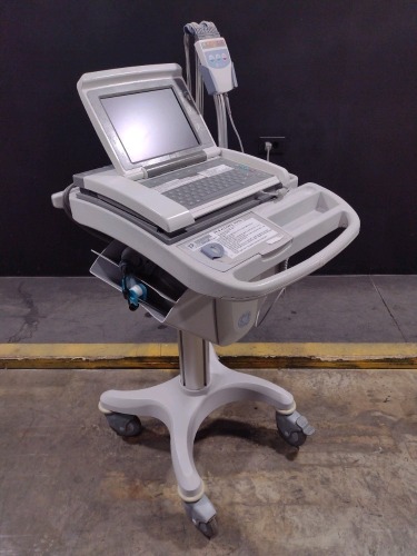 GE MAC 5500 ECG EKG MACHINE WITH LEADS LOCATED AT 3325 MOUNT PROSPECT RD. FRANKLIN PARK, IL 60131