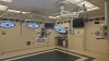STRYKER VISUM 2 CEILING MOUNT DUAL HEAD SURGICAL LIGHTS WITH QTY. 2 CONTROL PANELS, SINGLE HEAD SURGICAL LIGHT, VISIONPRO LED DISPLAY MONITOR, SWITCHPOINT INFINITY 3 MEDIA ROUTER, CONTROL SYSTEM, QTY. 2 VISUM LED SURRGICAL LIGHT SYSTEM, NEC WALL MONITOR L - 2