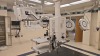 STRYKER VISUM 2 CEILING MOUNT DUAL HEAD SURGICAL LIGHTS WITH QTY. 2 CONTROL PANELS, SINGLE HEAD SURGICAL LIGHT, VISIONPRO LED DISPLAY MONITOR, SWITCHPOINT INFINITY 3 MEDIA ROUTER, CONTROL SYSTEM, QTY. 2 VISUM LED SURRGICAL LIGHT SYSTEM, NEC WALL MONITOR L - 10