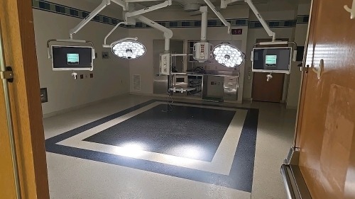 STRYKER VISUM 2 CEILING MOUNT SINGLE HEAD SURGICAL LIGHT WITH CONTROL PANEL, VISIONPRO LED DISPLAY MONITOR, CEILING MOUNT SINGLE HEAD SURGICAL, VISIONPRO LED DISPLAY MONITOR, SWITCHPOINT INFINITY 3 MEDIA ROUTER, VISUM LED SURGICAL LIGHT SYSTEM, NEC WALL M