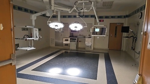 STRYKER VISUM 2 CEILING MOUNT SINGLE HEAD SURGICAL LIGHT WITH CONTROL PANEL, VISIONPRO LED DISPLAY MONITOR, CEILING MOUNT SINGLE HEAD SURGICAL, SWITCHPOINT INFINITY 3 MEDIA ROUTER, VISUM LED SURGICAL LIGHT SYSTEM, NEC WALL MONITOR LOCATED AT 900 W. CLAIRE