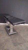 SKYTRON ELITE 3500 OR TABLE WITH HAND REMOTE