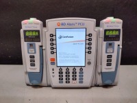 ALARIS PCU 8015 SERIES INFUSION PUMP WITH 8100 SERIES MODULES