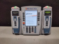 ALARIS PCU 8015 SERIES INFUSION PUMP WITH 8100 SERIES MODULES