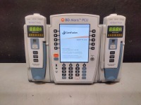 ALARIS PCU 8015 SERIES INFUSION PUMP WITH 8100 SERIES MODULES