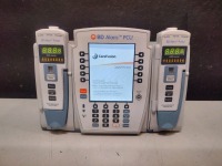 ALARIS PCU 8015 SERIES INFUSION PUMP WITH 8100 SERIES MODULES