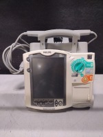 PHILIPS HEARTSTART MRX DEFIB WITH PACING, 3 LEAD ECG, CO2, SPO2, NIBP, ANALYZE, PADDLES, BATTERY