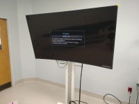 SAMSUNG UN65HU9000 4K, LED SMART CURVED TELEVISION ON POWER ISOLATION STAND (located at 204 Gateway North Marble Falls, TX 78654)