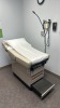 MIDMARK 404 EXAM TABLE WITH WELCH ALLYN 48200 LITE-BOX WITH LITE PIPE, LOC: PHYSICIANS OFFICE,