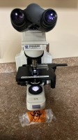 NIKON ECLIPSE E400 LAB MICROSCOPE 10X EYE PIECES WITH 4 OBJECTIVES