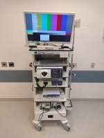 OLYMPUS 190 ENDOSCOPY TOWER TO INCLUDE: CLV-190 LIGHT SOURCE, CV-190 IMAGE PROCESSOR, OEP-5 PRINTER, OEV262H MONITOR, MAJ-1921 KEYBOARD, (2) BMI ENDOGATOR EGP-100 IRRIGATION PUMPS ON CART