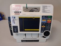 MEDTRONIC LIFEPAK 12 DEFIBRILLATOR WITH PADDLES