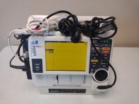MEDTRONIC LIFEPAK 12 DEFIBRILLATOR WITH PADDLES