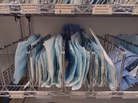 INSTRUMENTS ON SHELF: FIBERWIRE SCISSORS, RONGUERS, COBB ELEVATORS, CHANDLERS, KOLBEL RETRACTORS, SOFIELD RETRACTORS, HIBBS RETRACTORS, BONE HOOKS, HOHMAN RETRACTORS