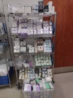 ETHICON ETHICON SUTURES (OPENED) WITH CART AND BIN