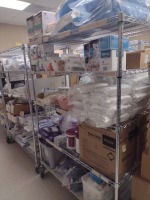 GLOVES, MASKS, SUTURES, WET SKIN PREP TRAYS, SANI-CLOTHS WITH CART (EXPIRED), LOC: MATMAG