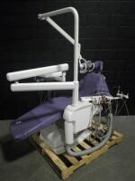 BELMONT X-CALIBUR DENTAL CHAIR W/EXAM LIGHT, FOOTSWITCH AND 4 HANDPIECES