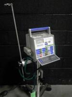 NEWPORT MEDICAL HT50 VENTILATOR ON ROLLING STAND