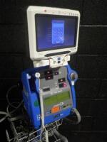 GE DINAMAP PRO 400V2 PATIENT MONITOR ON ROLLING STAND