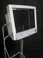 DATASCOPE SPECTRUM PATIENT MONITOR ON ROLLING STAND