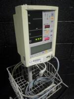 DATASCOPE ACCUTORR PLUS PATIENT MONITOR ON ROLLING STAND