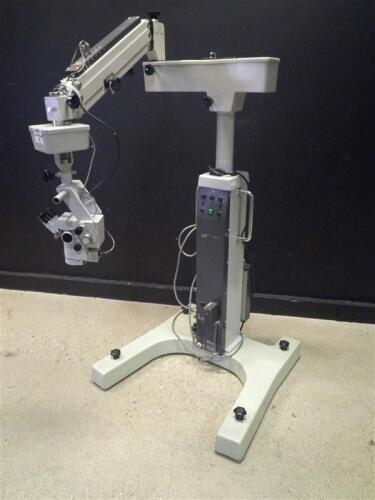 SURGICAL MICROSCOPE WITH SINGLE MOUNT BINOCULAR WITHE EYEPIECES BOTH ARE 12,5X,BOTTOM LENSE & FOOTSWITCH 100% refurb and guaranteed to fully function