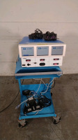 VALLEYLAB FORCETRIAD (SW 4.00) ENERGY PLATFORM WITH (4) FOOTSWITCHES (LIGASURE 1, LIGASURE 2, BIPOLAR, MONOPOLAR) ON ROLLING CART