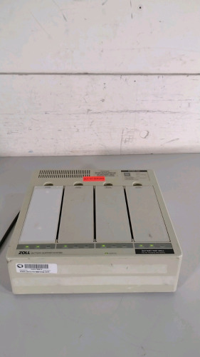 ZOLL PD 4420 BATTERY CHARGER WITH (4) BATTERIES