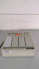 ZOLL PD 4420 BATTERY CHARGER WITH (4) BATTERIES