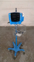 GE VITAL SIGNS MONITOR ON ROLLING STAND