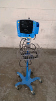 GE VITAL SIGNS MONITOR ON ROLLING STAND