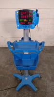 GE DINAMAP V100 VITAL SIGNS MONITOR ON ROLLING STAND