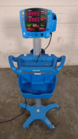GE DINAMAP V100 VITAL SIGNS MONITOR ON ROLLING STAND