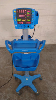 GE DINAMAP V100 VITAL SIGNS MONITOR ON ROLLING STAND