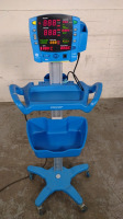 GE DINAMAP V100 VITAL SIGNS MONITOR ON ROLLING STAND