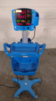 GE DINAMAP V100 VITAL SIGNS MONITOR ON ROLLING STAND