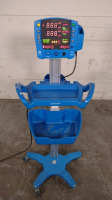 GE DINAMAP V100 VITAL SIGNS MONITOR ON ROLLING STAND