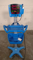 GE DINAMAP V100 VITAL SIGNS MONITOR ON ROLLING STAND