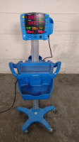 GE DINAMAP V100 VITAL SIGNS MONITOR ON ROLLING STAND