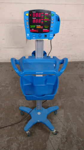 GE DINAMAP V100 VITAL SIGNS MONITOR ON ROLLING STAND